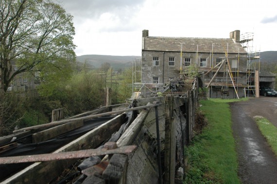 scaffold on south face of building and collapsed leat