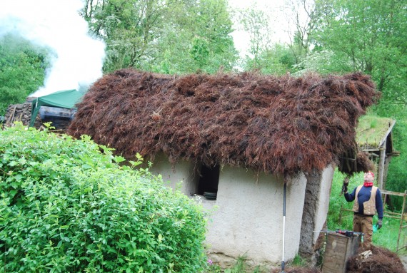 completed dabbin with thatched roof