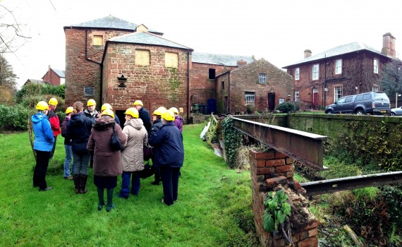 SPAB volunteers visiting Warwick Bridge Corn Mill Volunteers in the grounds at Warwick Bridge Corn Mill