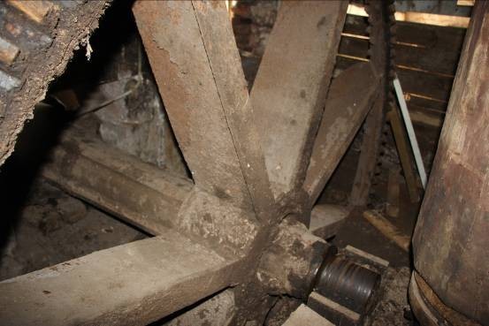 close up of waterwheel axle and bearing