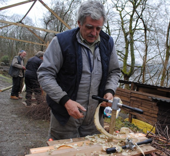 man using hand tools