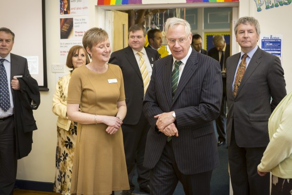 group of visitors in school