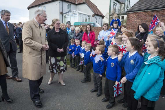 schoolchildren waiting for Royal visitor.