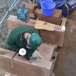masons working on new stones