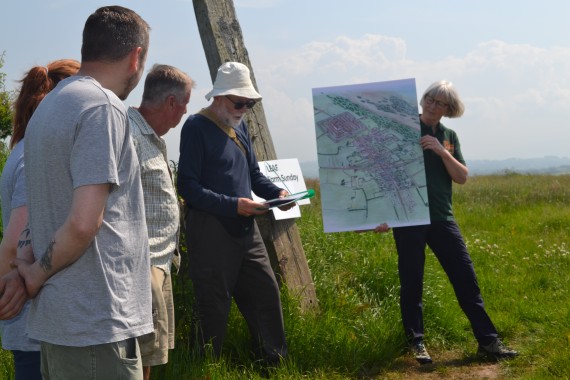 people looking at plans of subsurface imagingtext...