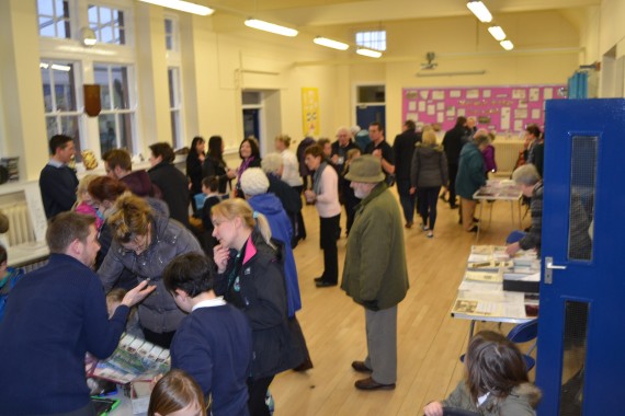 children in school hall showing work ..